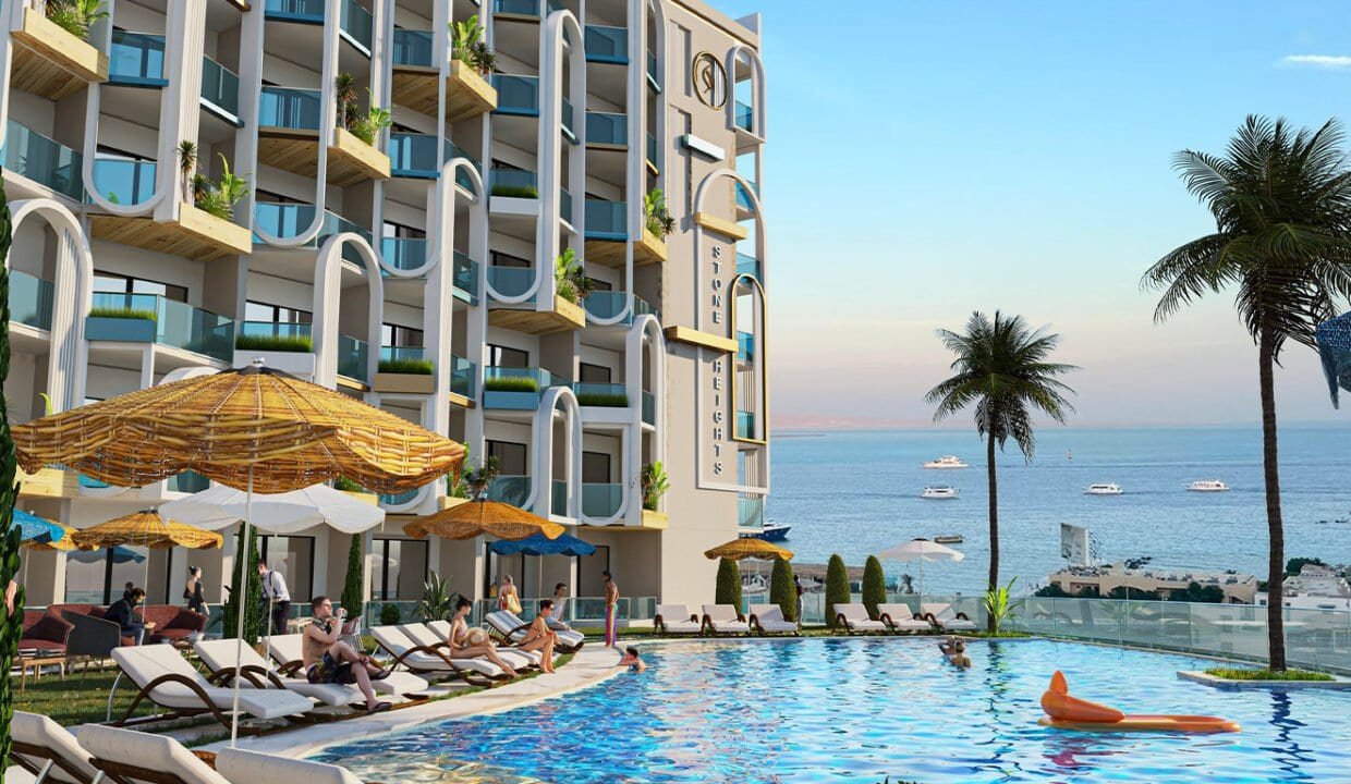 Bright apartment with balcony overlooking the pool and sea.