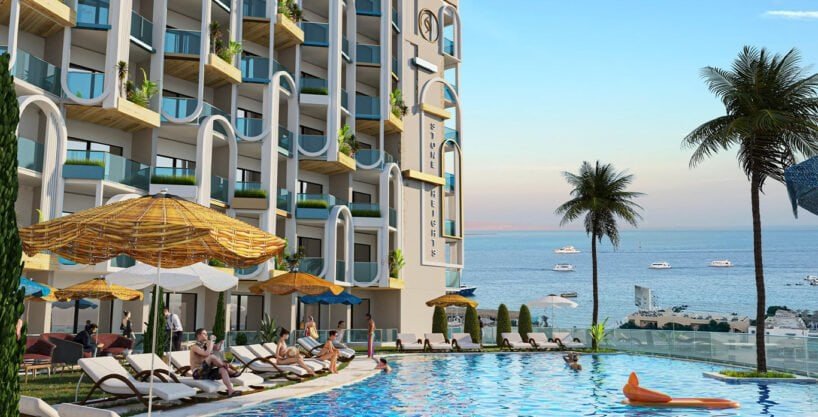 Bright apartment with balcony overlooking the pool and sea.