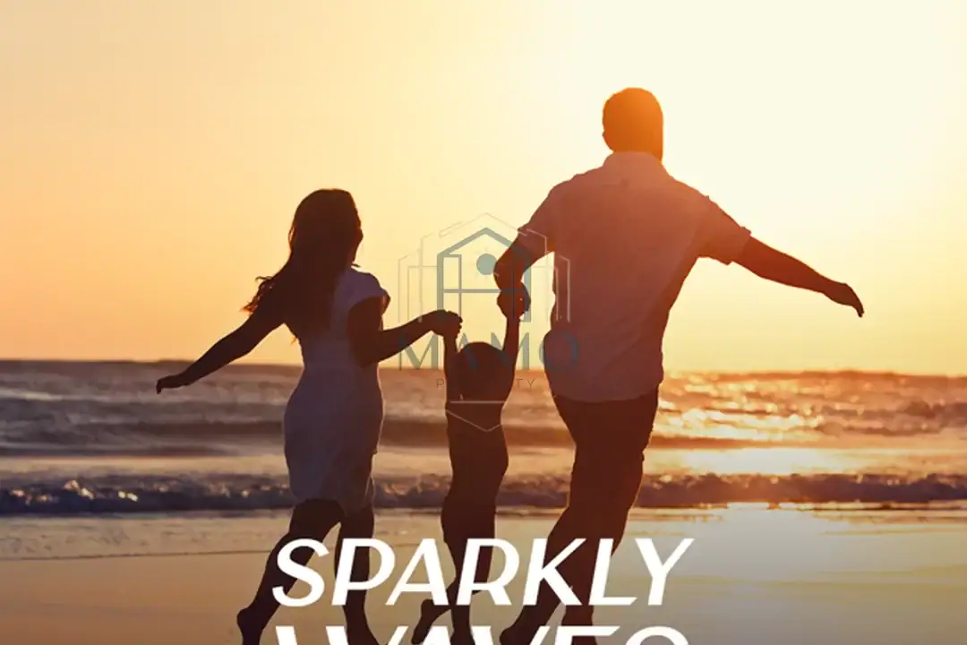 Family enjoying sunset on the beach, ideal for luxury sea view property investments in Hurghada.