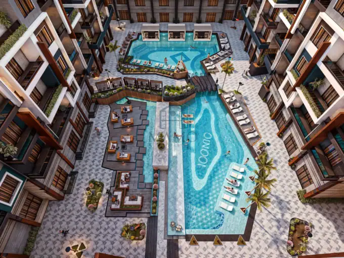 Elegant poolside view at Iconic Resort Hurghada, featuring multiple pools and relaxing spaces.