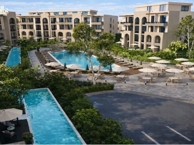 Pool area with sun loungers and umbrellas at Trivana, Hurghada.