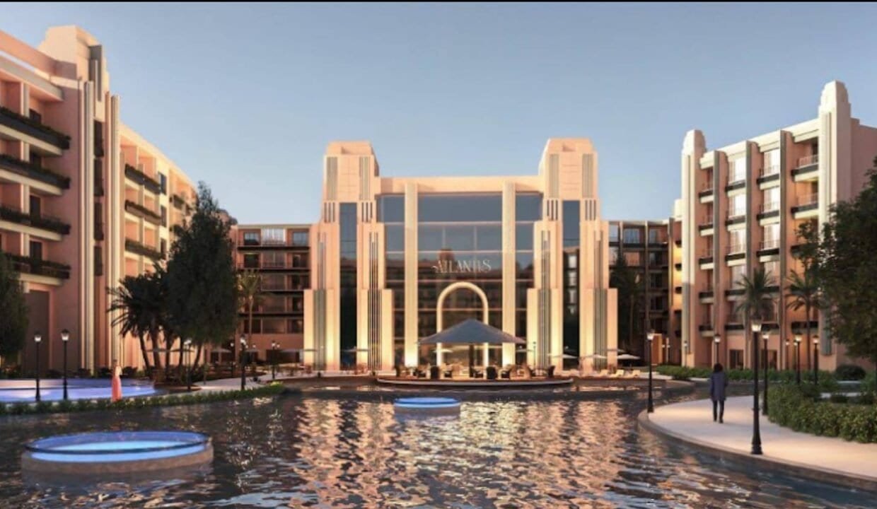 Elegant resort entrance with water fountain and lush landscaping in Hurghada.