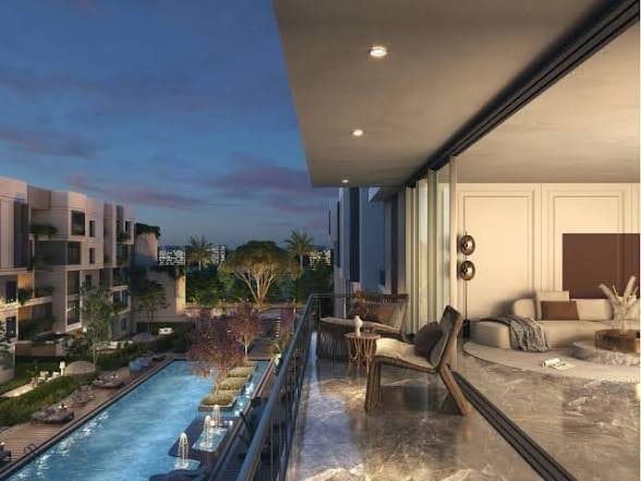 Balcony overlooking the pool and sea at Trivana Residences, Hurghada.
