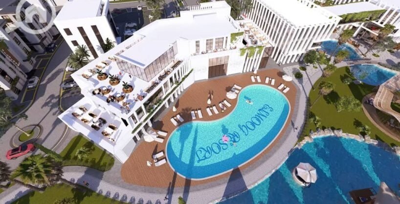 Modern resort with swimming pool, sun loungers, and outdoor seating area in Hurghada.
