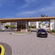 AL Mouj Resort Magawish - grand entrance gate with palm-lined driveway and security pavilion