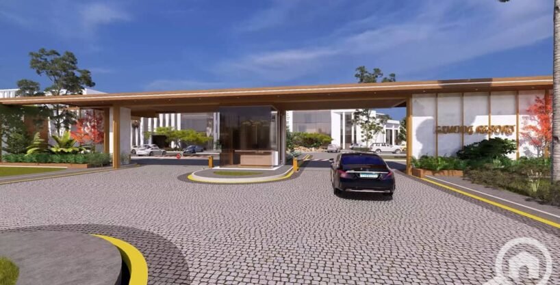 AL Mouj Resort Magawish - grand entrance gate with palm-lined driveway and security pavilion