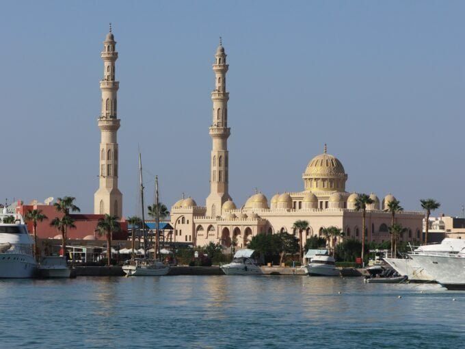 Hurghada marina at sunset with yachts and Red Sea views — MAMO Property Cost of Living Guide 2026