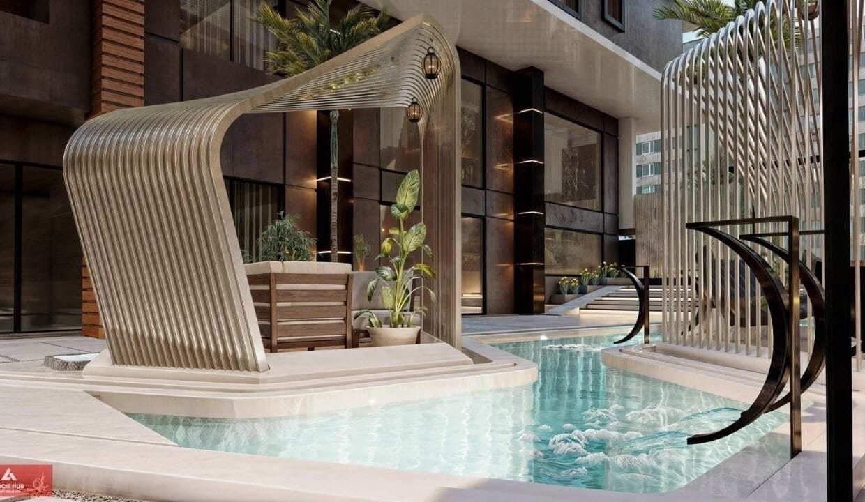 Modern hotel pool with stylish sunshade and seating in Hurghada.