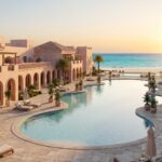 BELLAMAR DELUXE Port Ghalib - Beachfront pool deck with Mediterranean arches