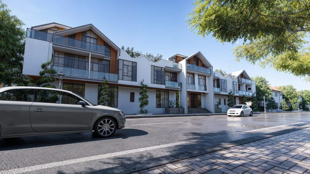 La Vida Magawish — Straßenansicht der Boutique-Townhäuser mit Giebeln