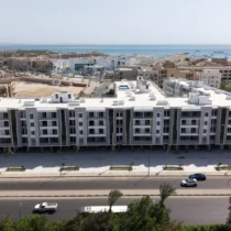 Aerial view of Mark Resort apartment buildings in Al Kawther, Hurghada, with the sea in the distance