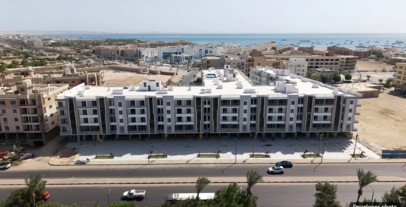 Aerial view of Mark Resort apartment buildings in Al Kawther, Hurghada, with the sea in the distance