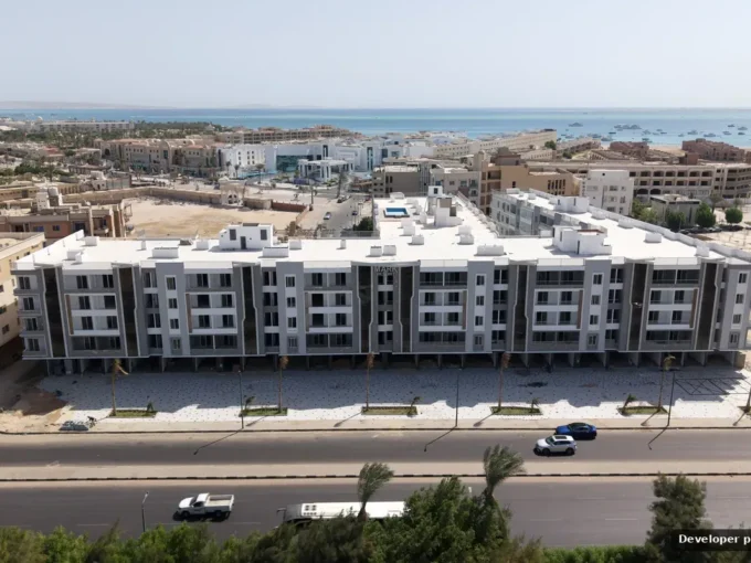 Aerial view of Mark Resort apartment buildings in Al Kawther, Hurghada, with the sea in the distance