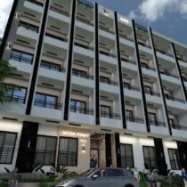 INTER POINT Hurghada — building 101 entrance with palm landscaping