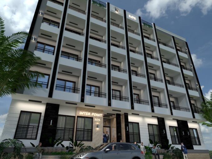 INTER POINT Hurghada — building 101 entrance with palm landscaping